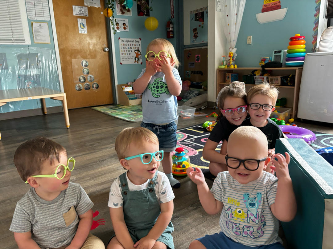 children playing in a classroom